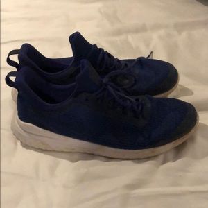 Blue nike rival shoes